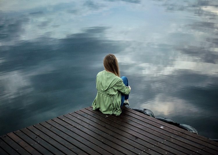 Alone by a lake