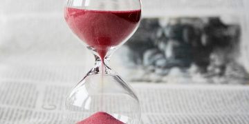 Welsh democracy: an hourglass with red sand